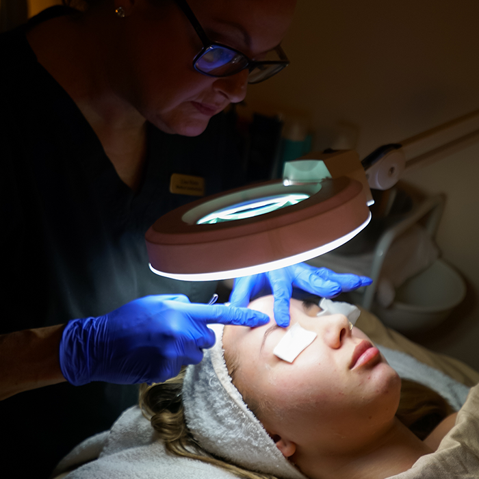 woman receiving skin care services